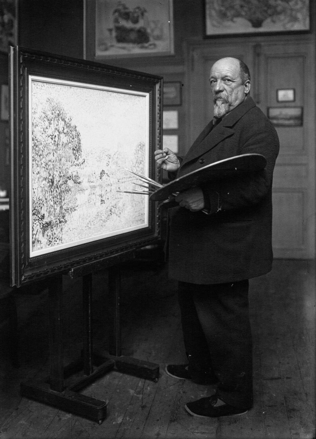 Portrait of Paul Signac near his easel